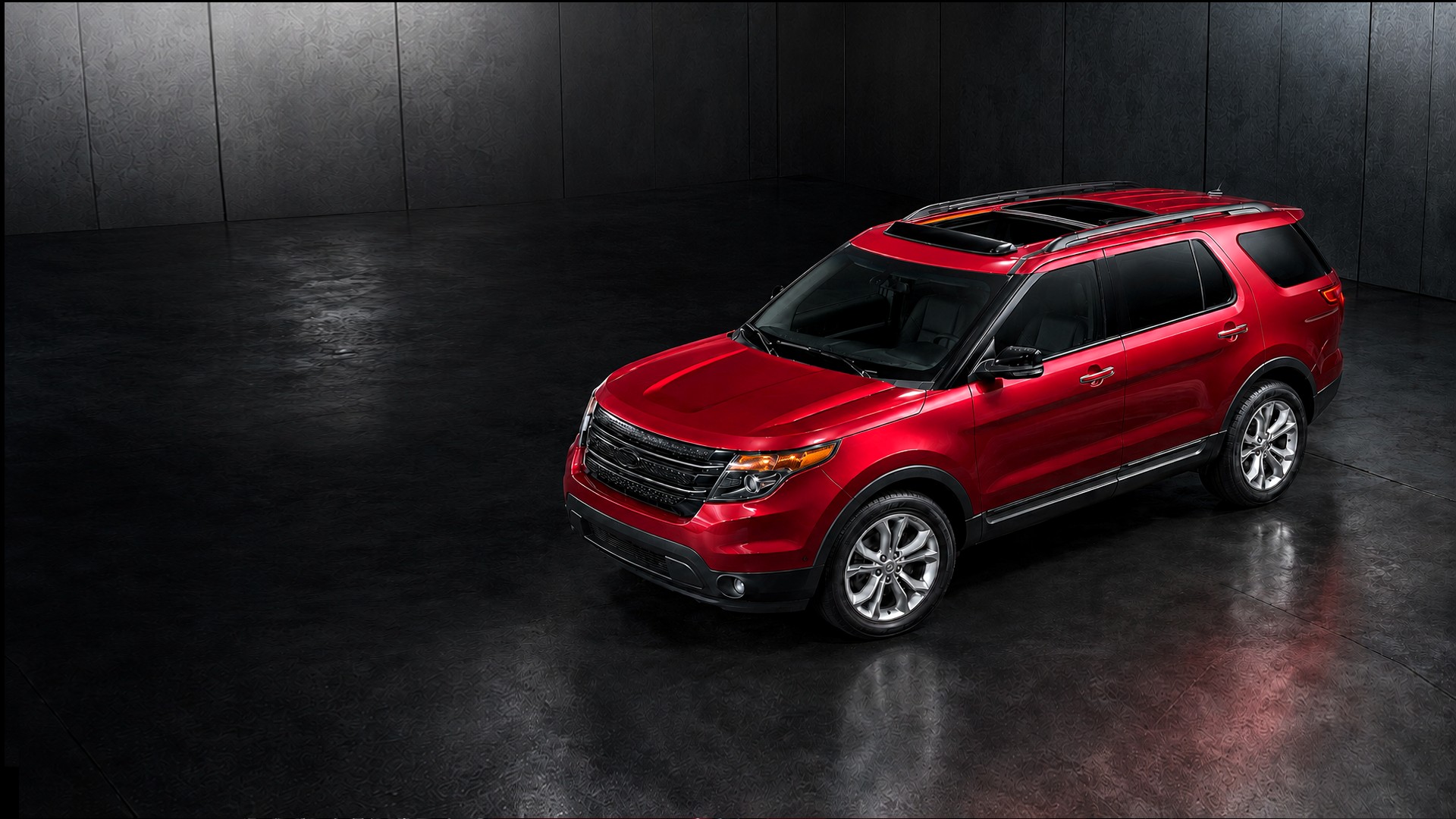 Red SUV with a Voron Glass sunroof deflector fitted above the open roof